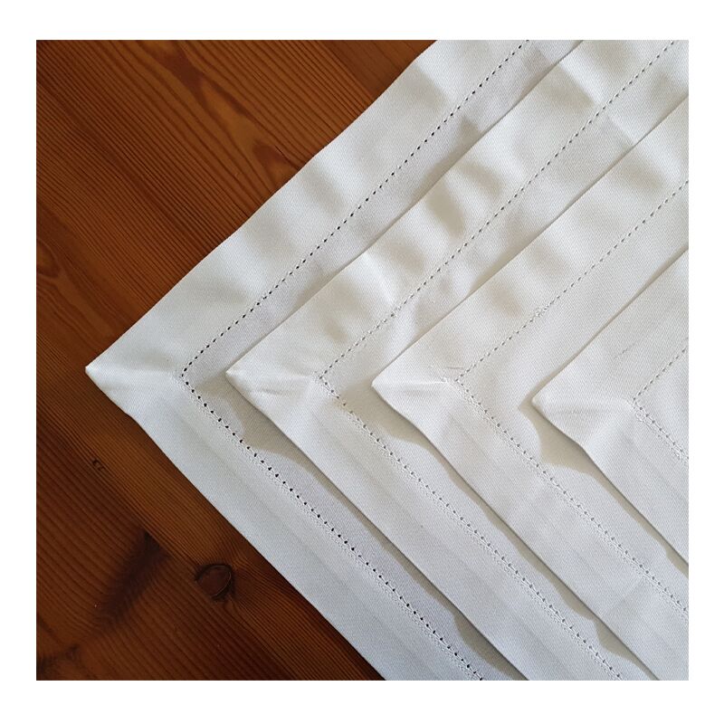 White cotton place mats showing hemstitch detail